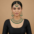 Royal Emerald Necklace Set detail showing polki bib tiers and emerald teardrop fringe