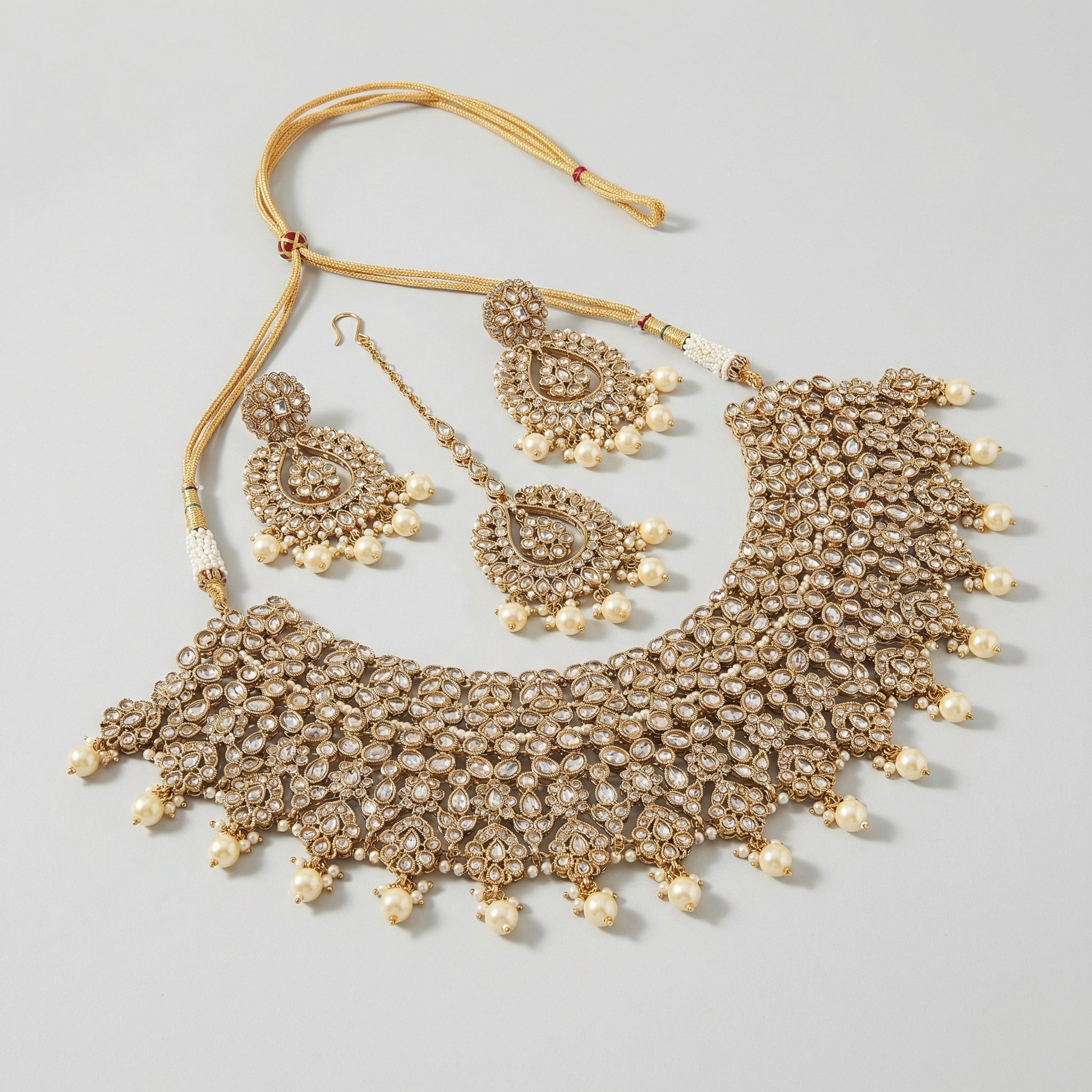 Maharani Kundan Set detail showing clear floral kundan motifs and pearl fringe