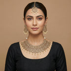 Maharani Kundan Set detail showing clear floral kundan motifs and pearl fringe
