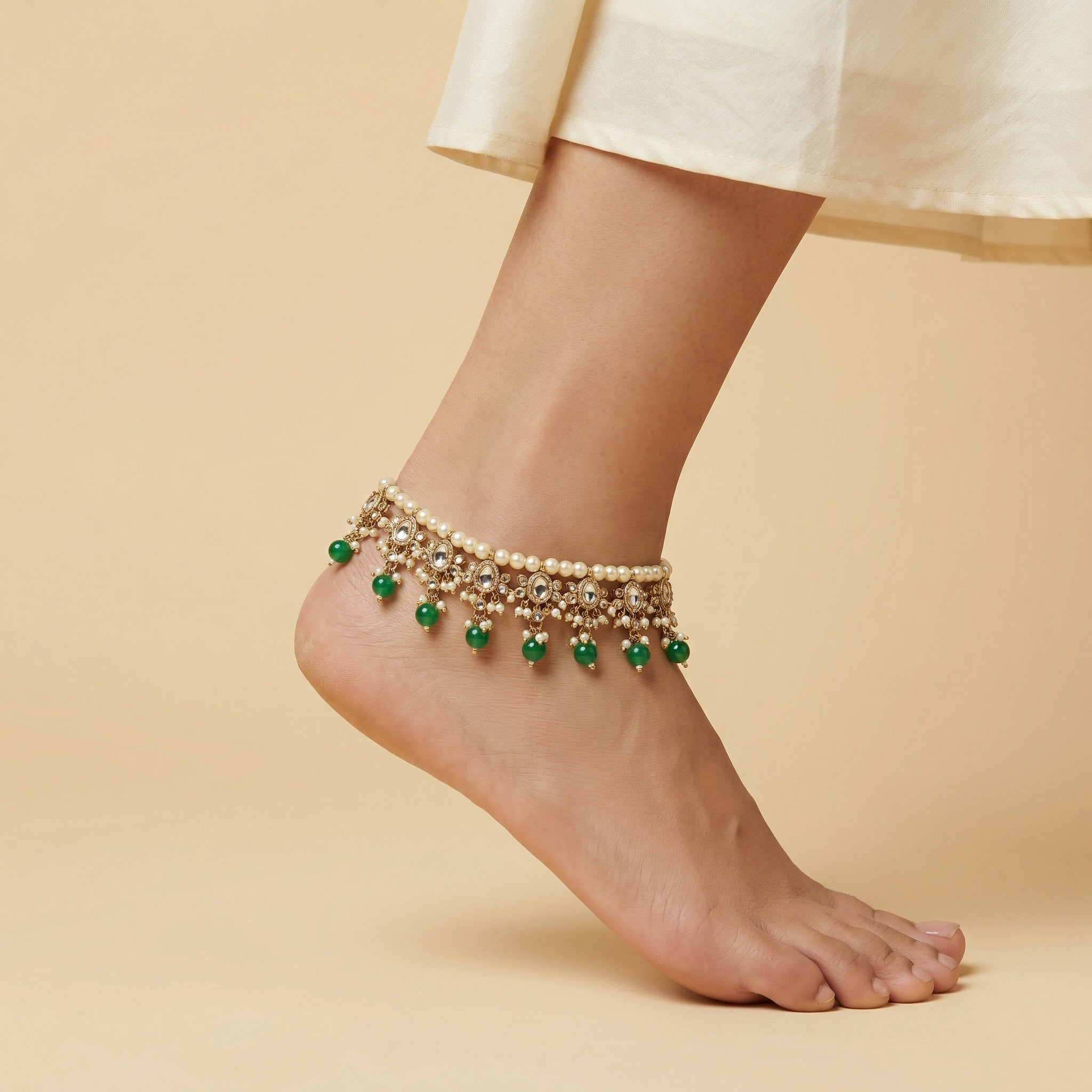 Emerald Pearl Anklets detail showing kundan ovals emerald beads and pearl strand