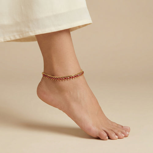 Crimson Gold Payal close-up of prong-set red stones and lobster clasp