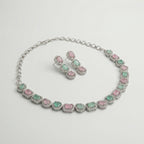 Anya Rose Mint Set detail showing pastel pink and mint green gemstone halos