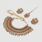 Royal Ruby Kundan Set detail showing ruby teardrop fringe and kundan crystal rows