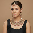 Royal Ruby Kundan Set detail showing ruby teardrop fringe and kundan crystal rows
