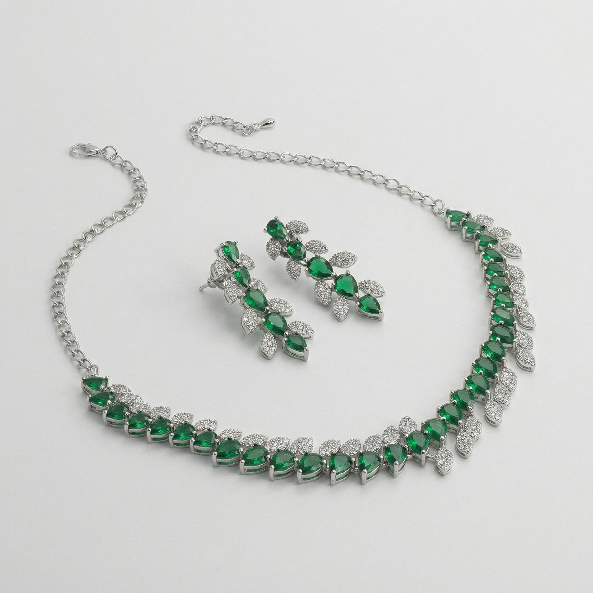 Emerald Vine Necklace Set detail showing emerald green stones and crystal leaf accents