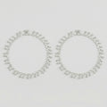 Shimmering Charm Anklets pair of silver-tone ghungroo bell payals on gray background