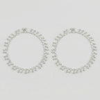 Shimmering Charm Anklets pair of silver-tone ghungroo bell payals on gray background
