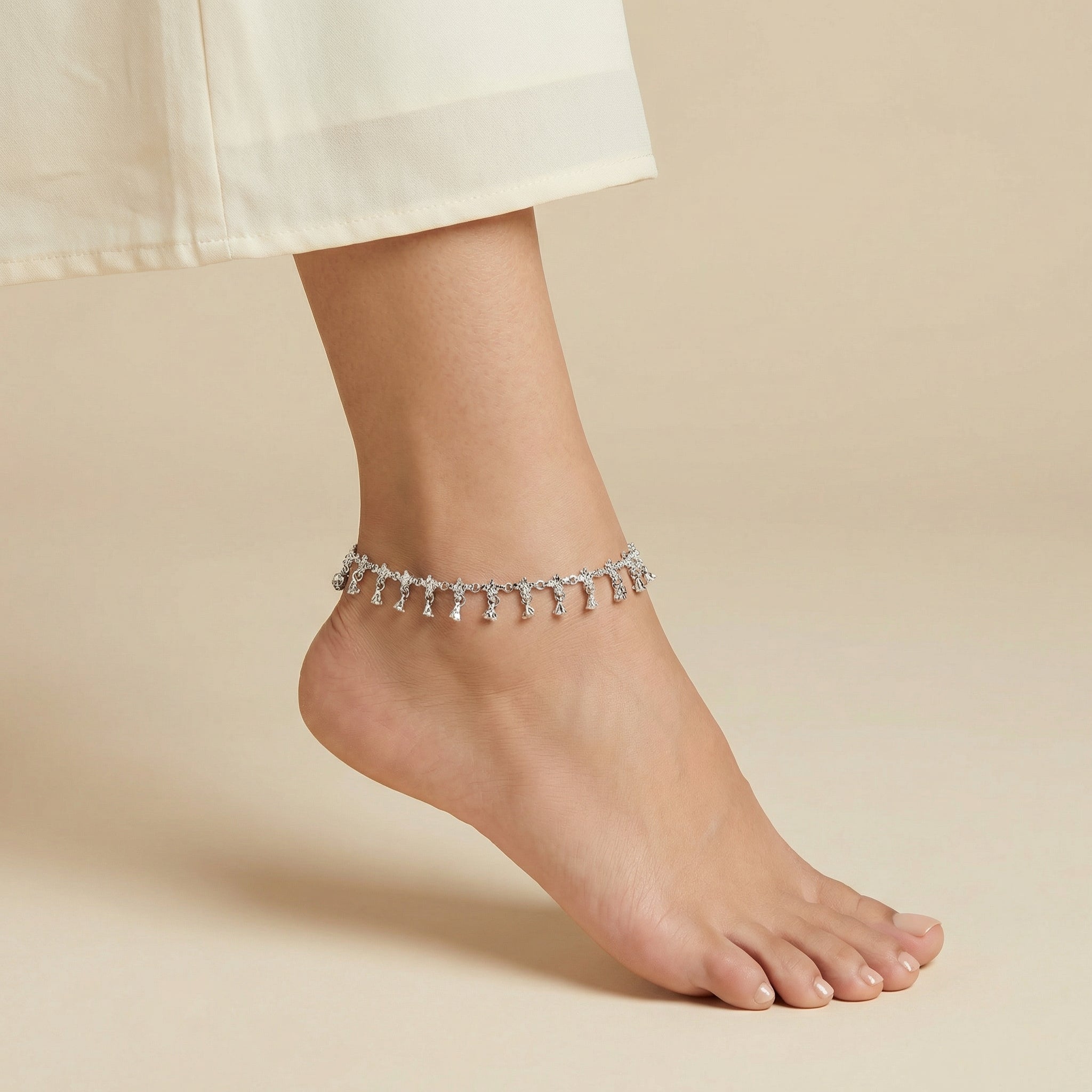 Shimmering Charm Anklets detail showing dense mini bells and S-hook clasp