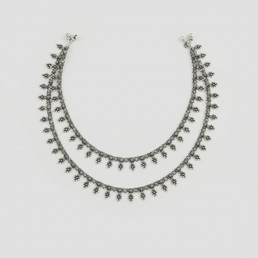 Silver Grapevine Anklets pair of oxidized silver leaf charm payals with ghungroo bells on gray background