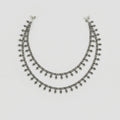 Silver Grapevine Anklets pair of oxidized silver leaf charm payals with ghungroo bells on gray background