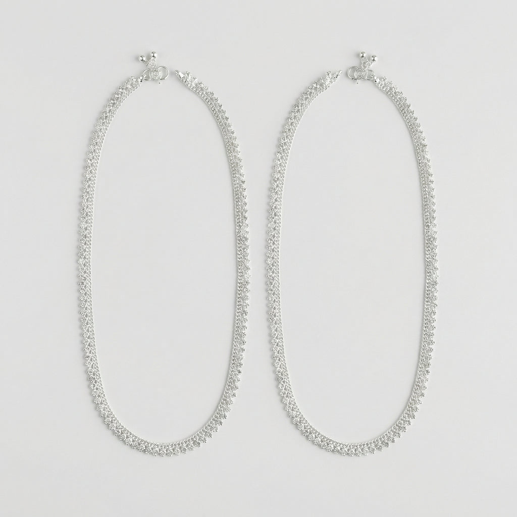 Sterling Sparkle Anklets pair of polished silver-tone scalloped payals with ghungroo beads on white background