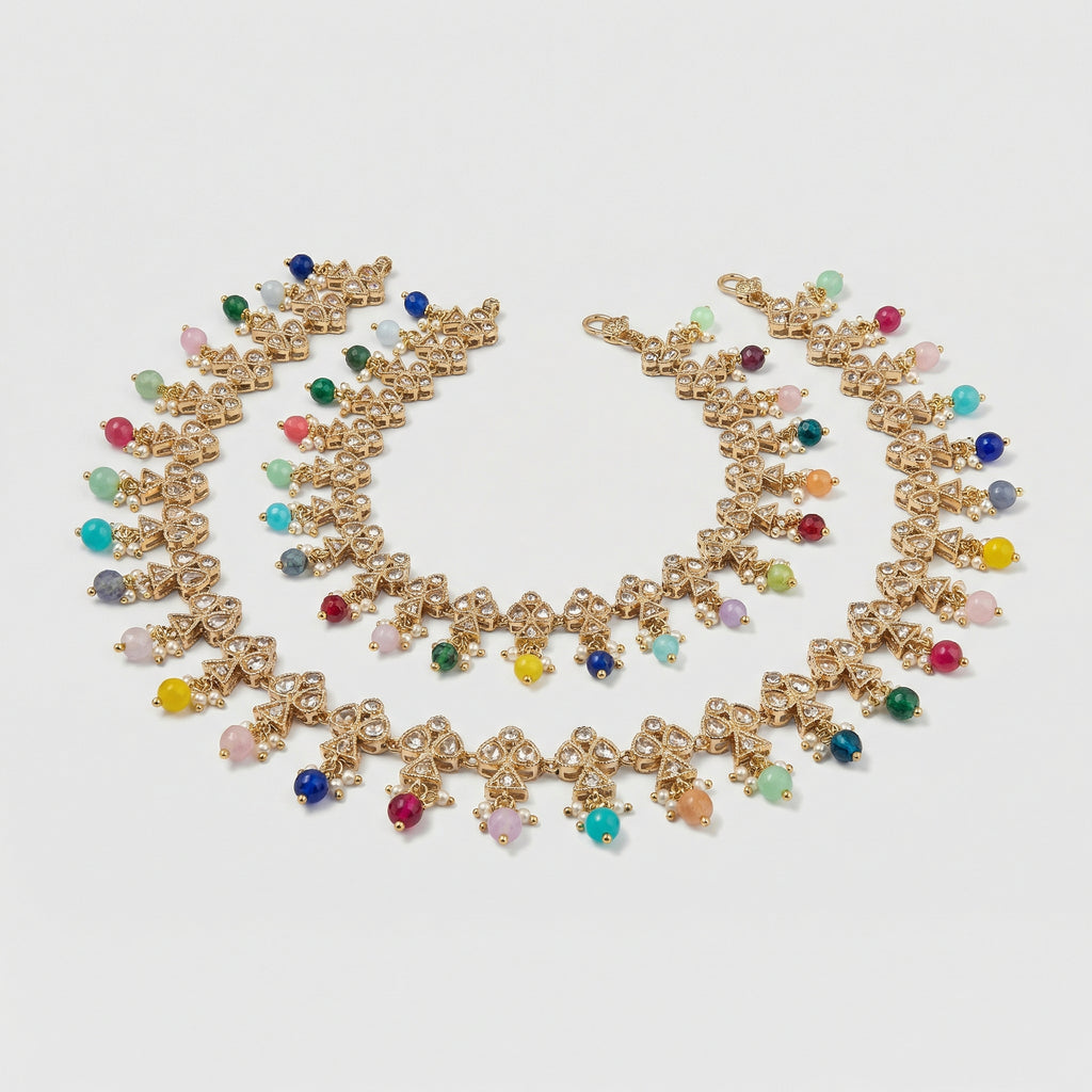 Navrang Kundan Anklets detail of filigree links and rainbow bead fringe