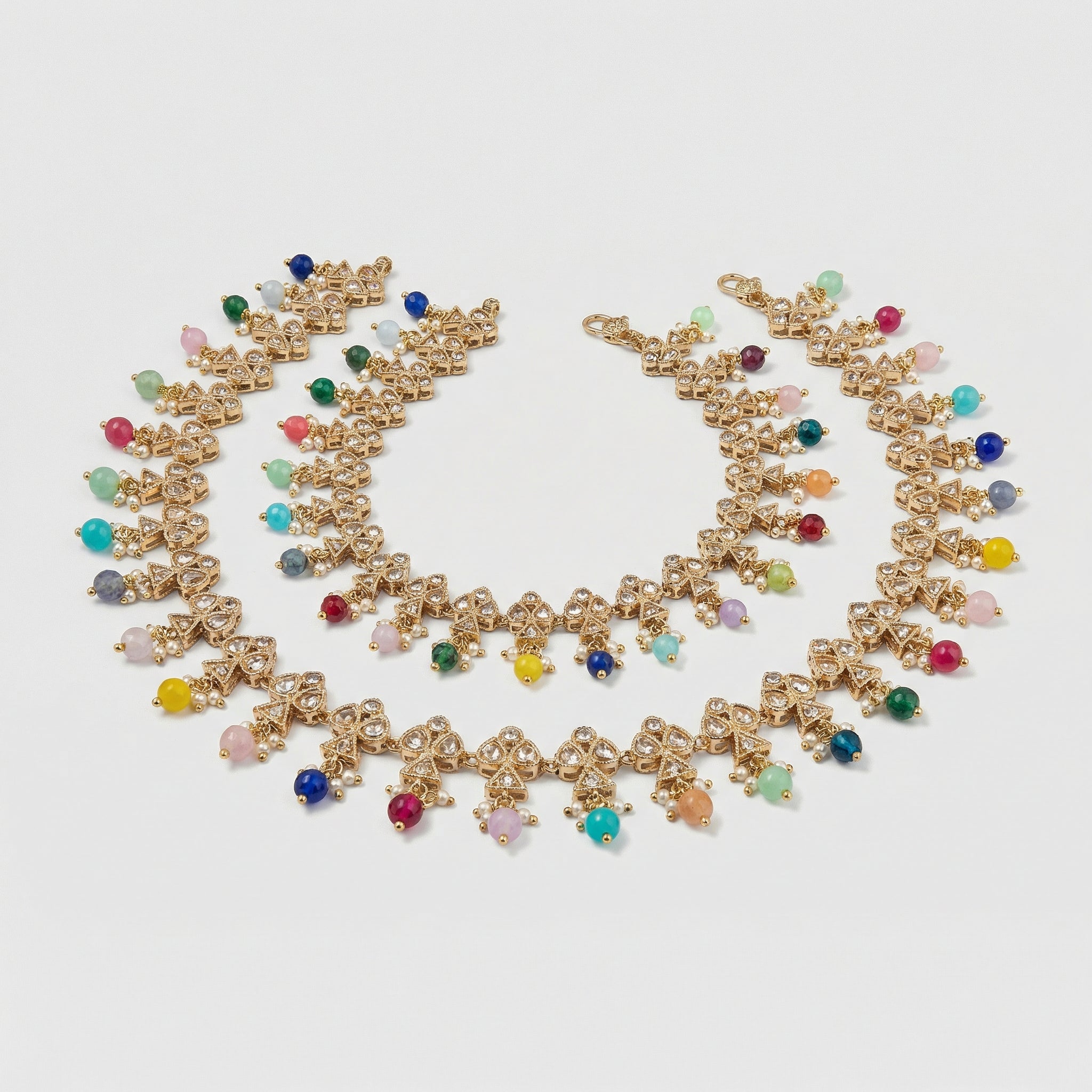 Navrang Kundan Anklets detail of filigree links and rainbow bead fringe