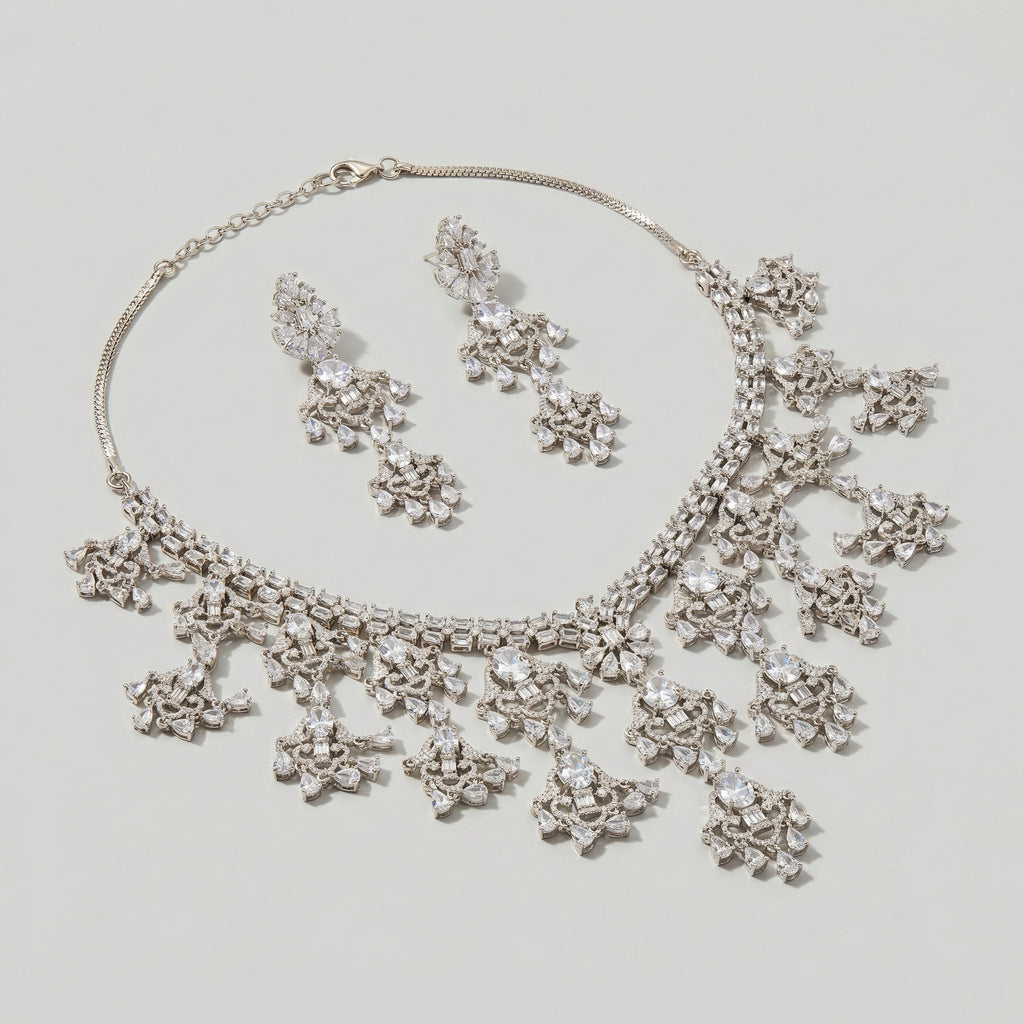 Close-up flatlay of Elegant Silver Statement Set necklace and matching earrings