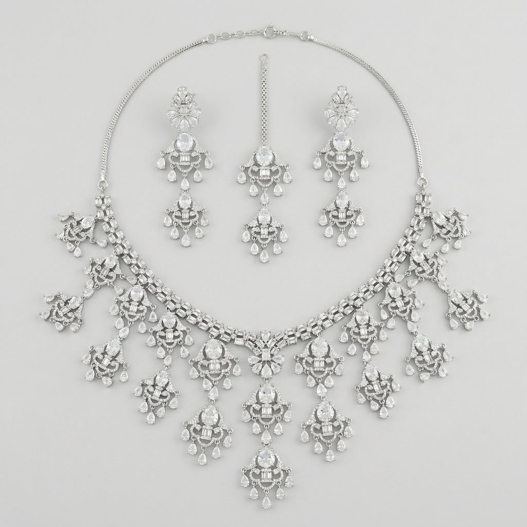 Elegant Silver Statement Set silver-plated statement necklace set with matching earrings in a studio flatlay