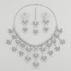 Elegant Silver Statement Set silver-plated statement necklace set with matching earrings in a studio flatlay