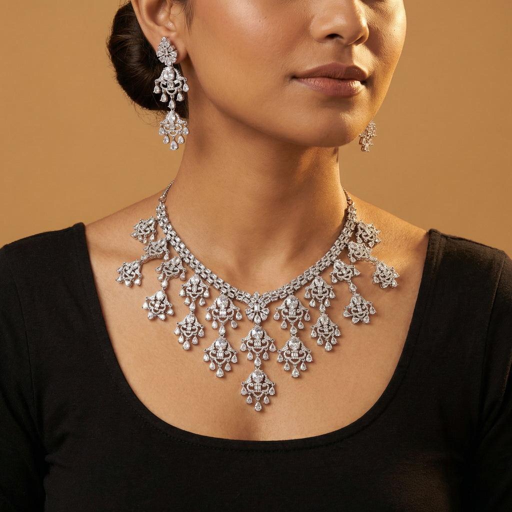 South Asian woman wearing Elegant Silver Statement Set statement necklace with matching earrings — bridal look