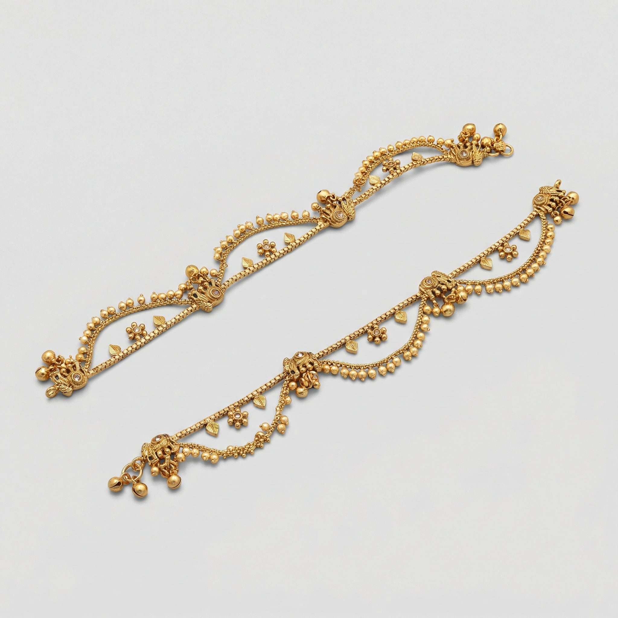 Tara Gold Payal detail showing floral charms crystal centers and bell clusters