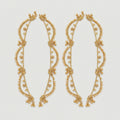 Tara Gold Payal pair of gold-tone scalloped floral payals with ghungroo bells on gray background