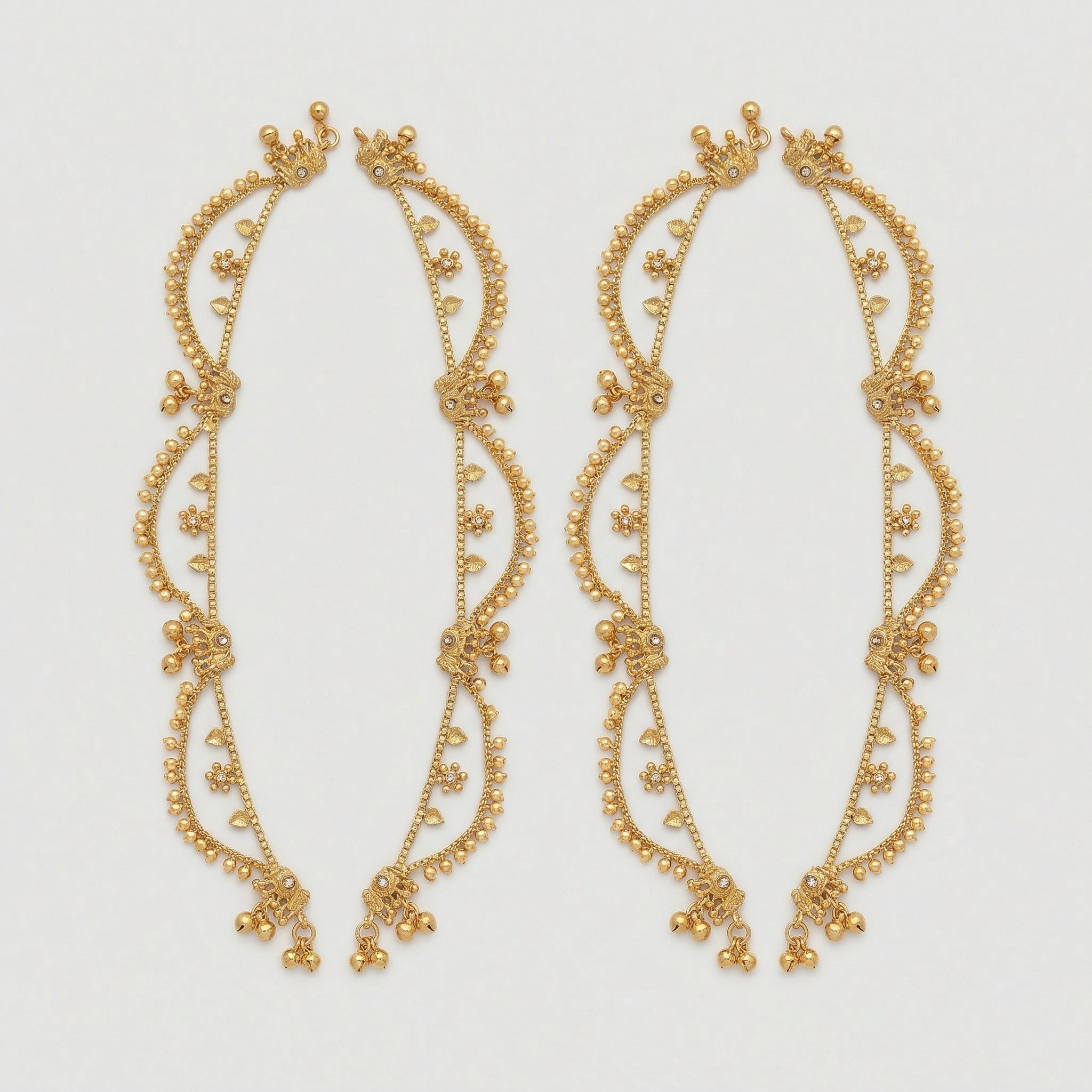 Tara Gold Payal pair of gold-tone scalloped floral payals with ghungroo bells on gray background