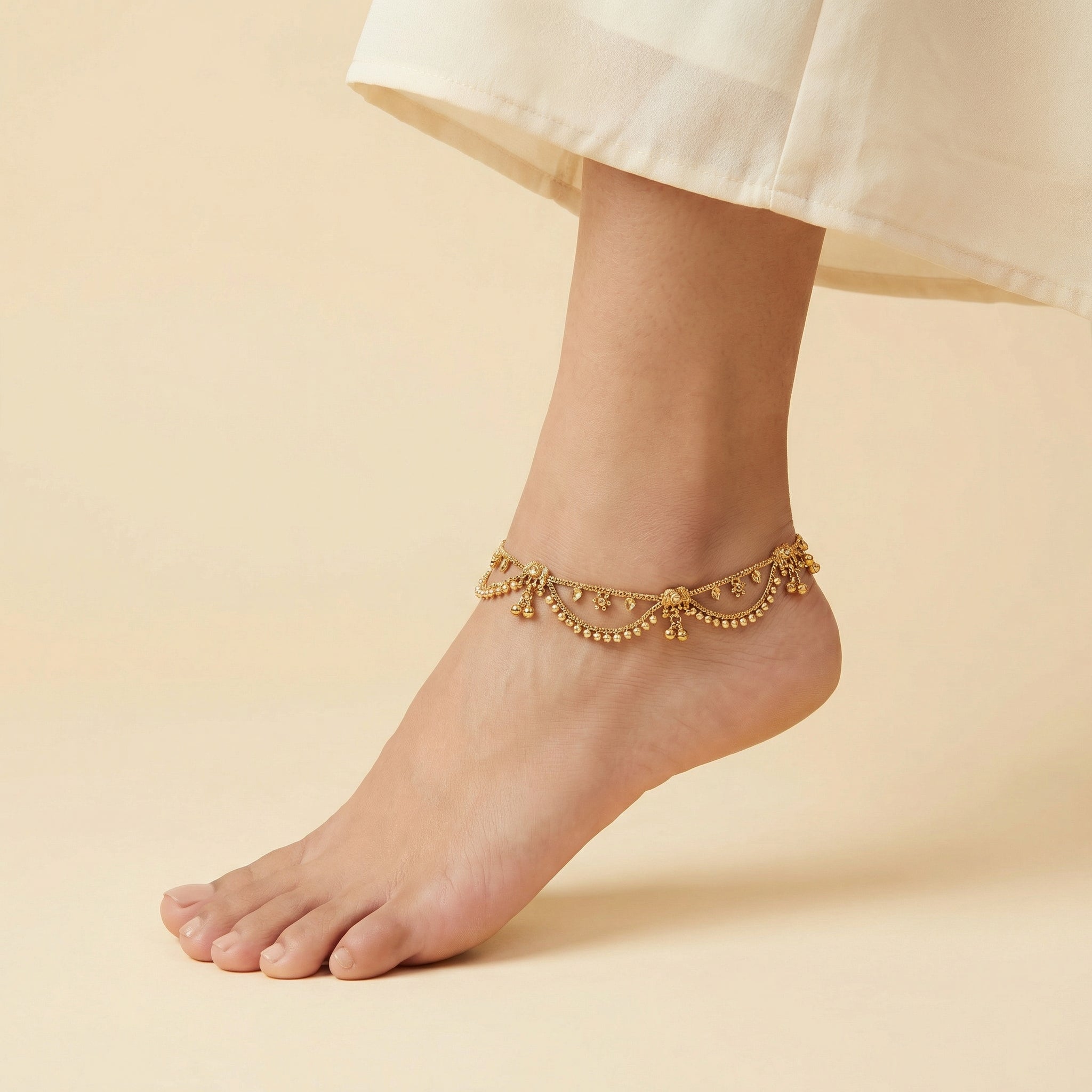 Tara Gold Payal detail showing floral charms crystal centers and bell clusters