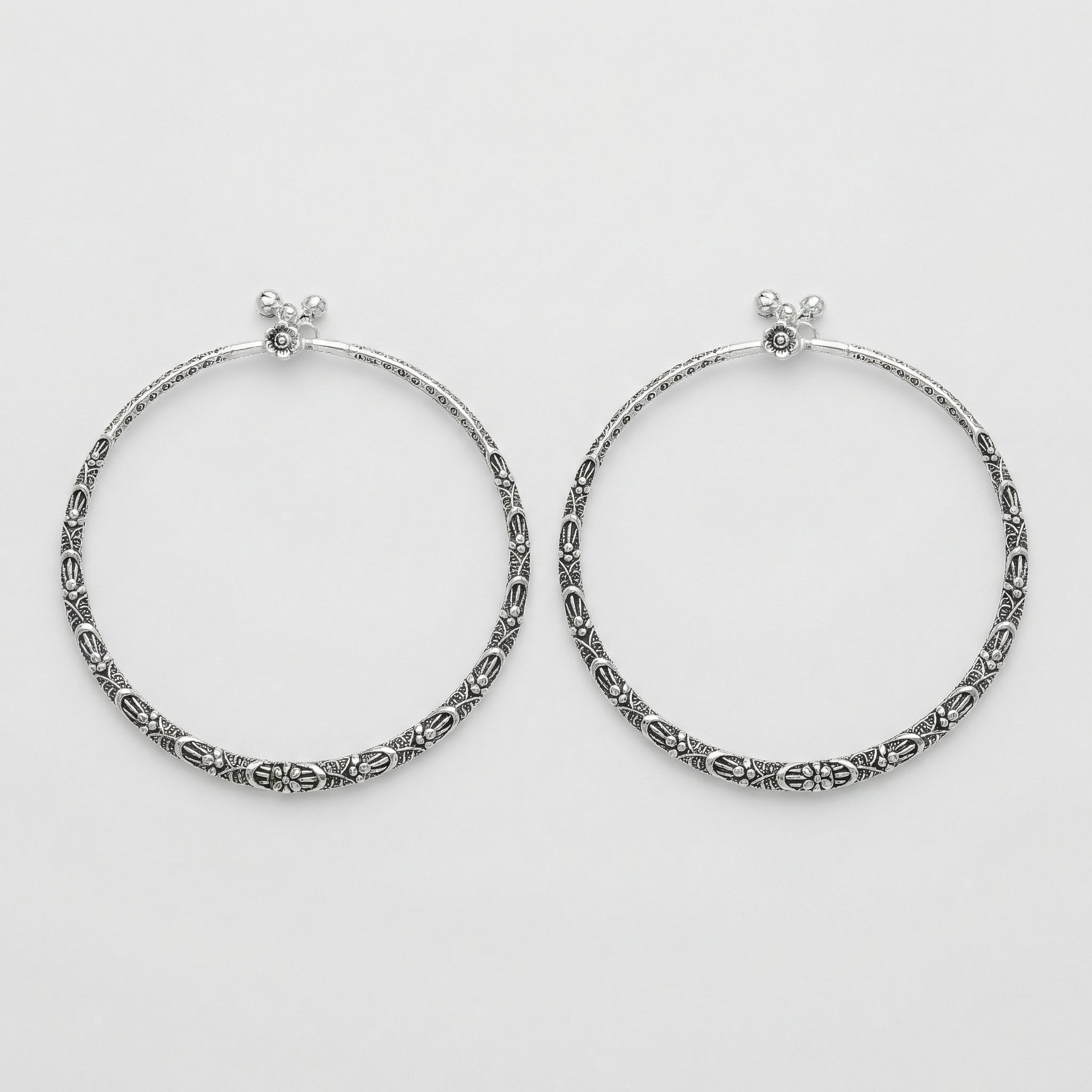 Oxidized Floral Anklets detail showing granulated floral pattern and screw clasp