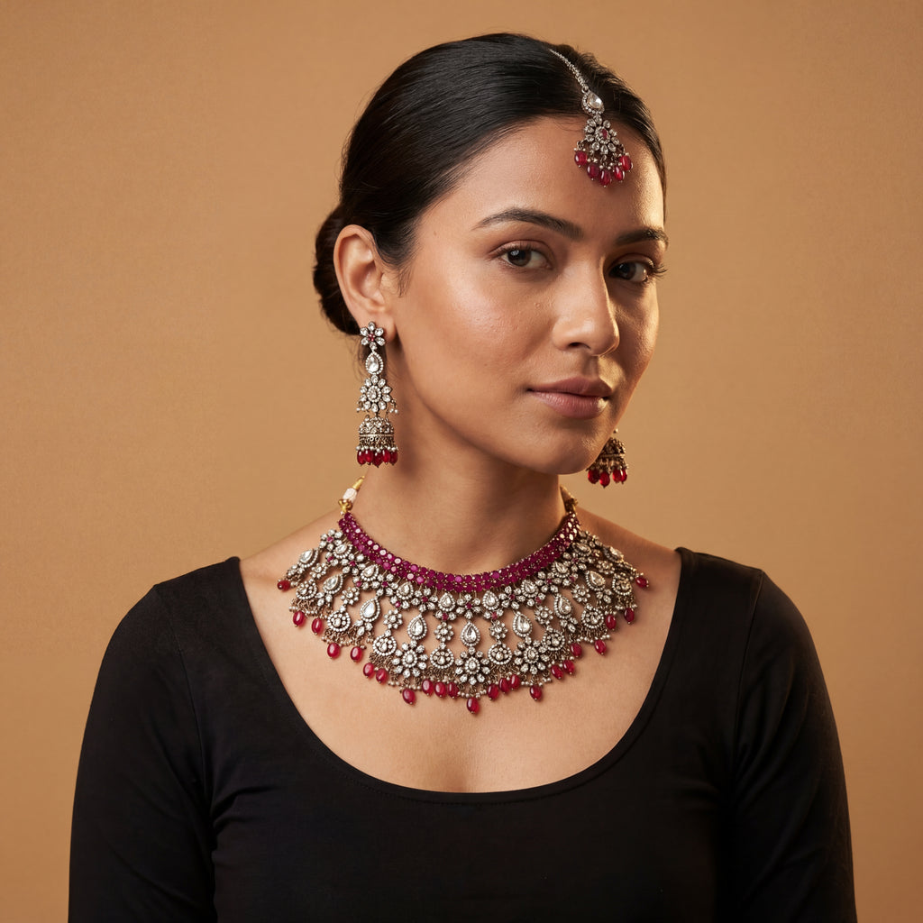 Regal Crimson Choker Set detail showing ruby-red stone rows and red teardrop bead fringe