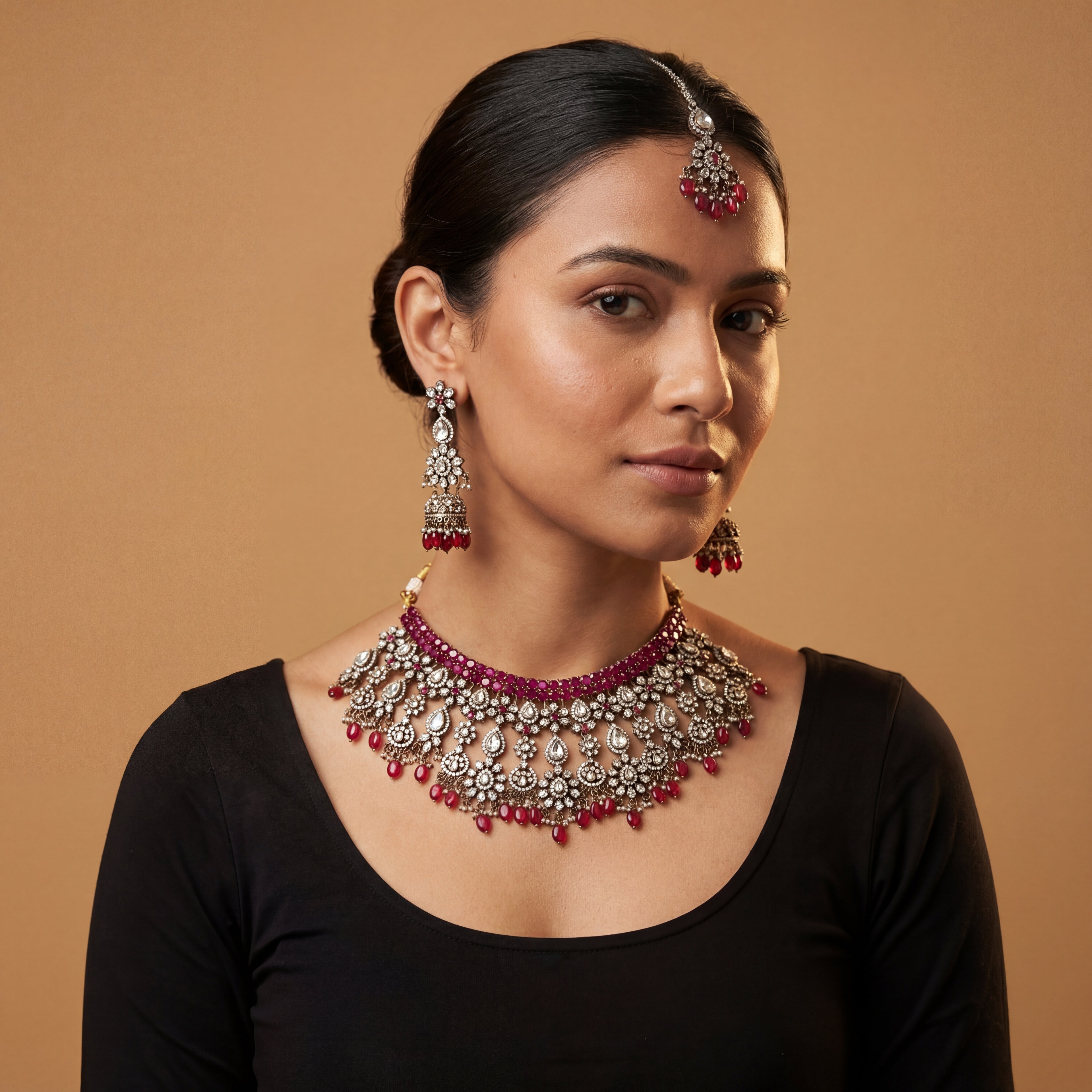 Regal Crimson Choker Set detail showing ruby-red stone rows and red teardrop bead fringe