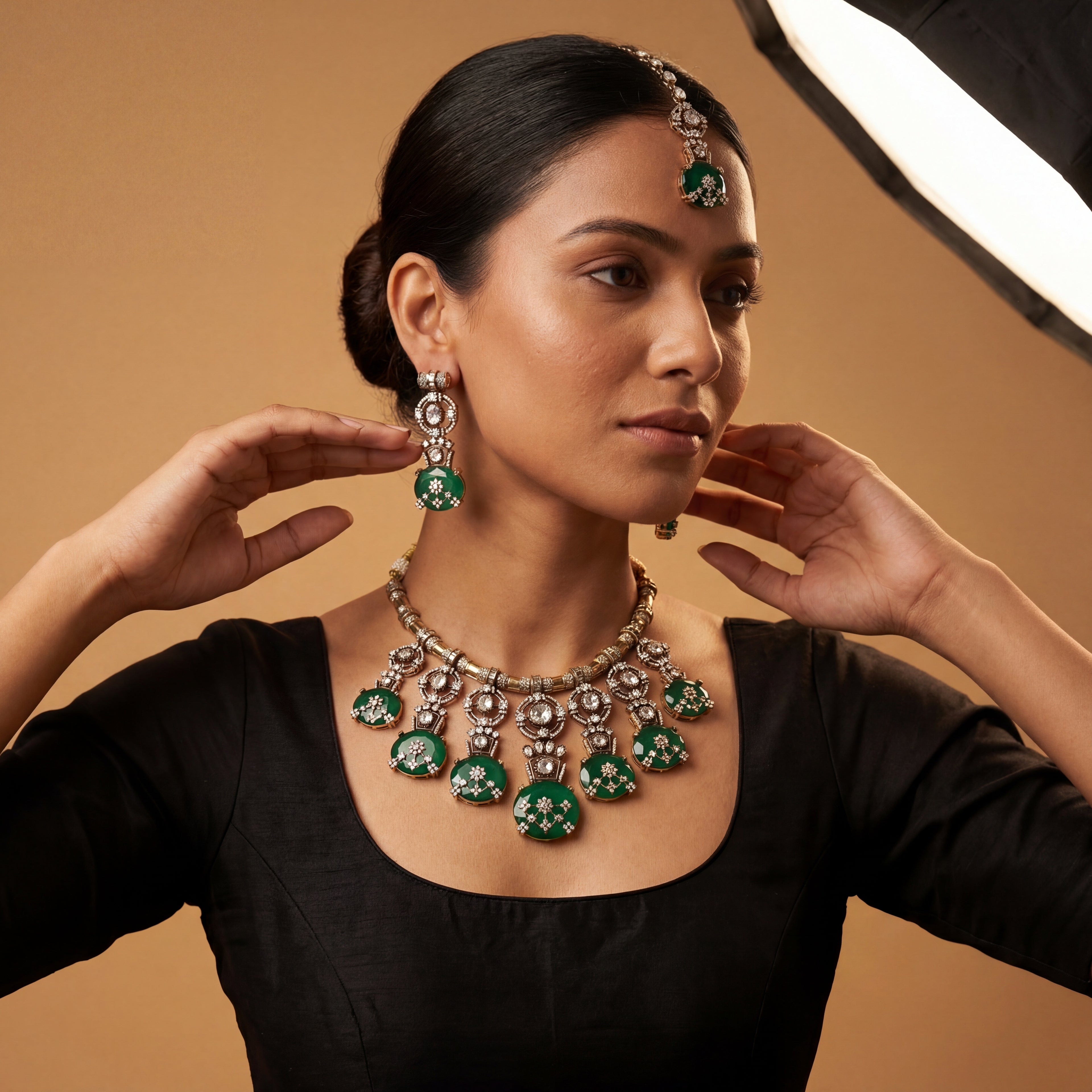 Zaira Emerald Necklace Set detail showing emerald cabochon drops and filigree polki pendant work