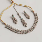 Aria Pastel Necklace Set detail showing teardrop polki links and pastel mint-green and pink cabochons