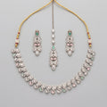 Aria Pastel Necklace Set silver collar necklace with mint and pink stones, earrings, and maang tikka on gray background