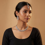 Aria Pastel Necklace Set detail showing teardrop polki links and pastel mint-green and pink cabochons