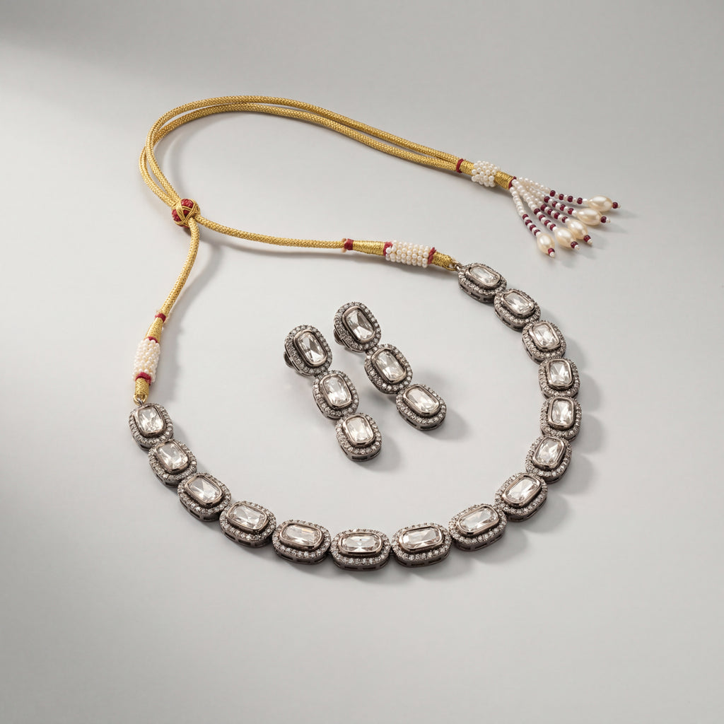Elara Silver Polki Set detail showing clear polki center stones, crystal halos, and gold dori cord with pearl tassels