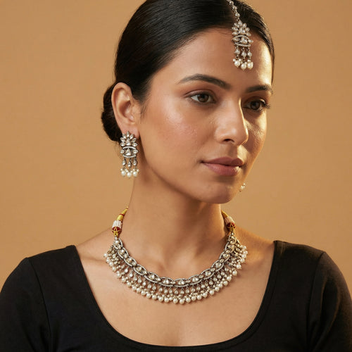Anmol Pearl Heirloom Necklace Set detail of polki teardrops and pearl fringe charms