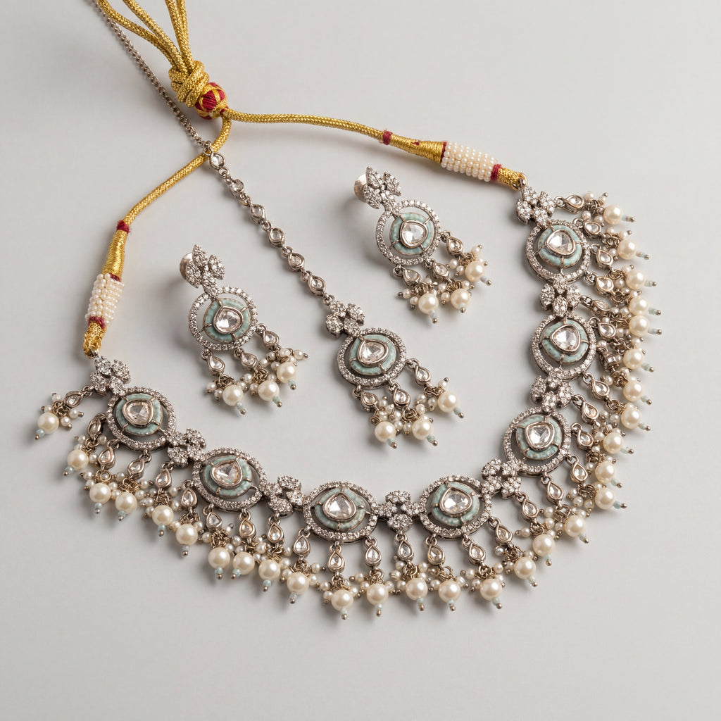 Aria Mint Pearl Set detail showing mint-green meenakari borders, polki centers, and pearl drop fringe