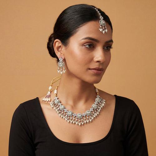 Aria Mint Pearl Set detail showing mint-green meenakari borders, polki centers, and pearl drop fringe