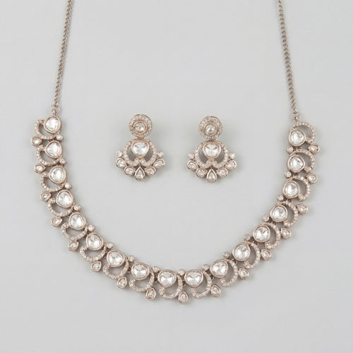 Aria Crystal Necklace Set silver polki collar necklace with matching chandelier drop earrings on gray background