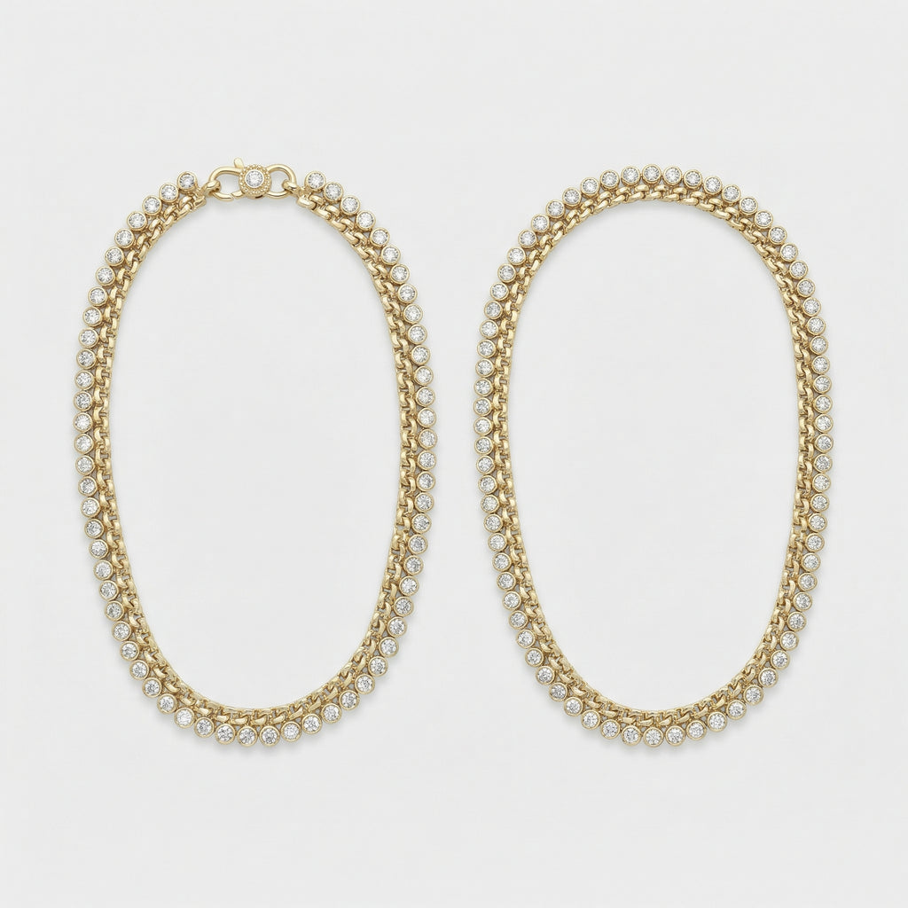 Radiant Gold Tennis Anklets pair of gold-tone double-row crystal payals on curb chain on gray background