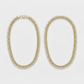 Radiant Gold Tennis Anklets pair of gold-tone double-row crystal payals on curb chain on gray background
