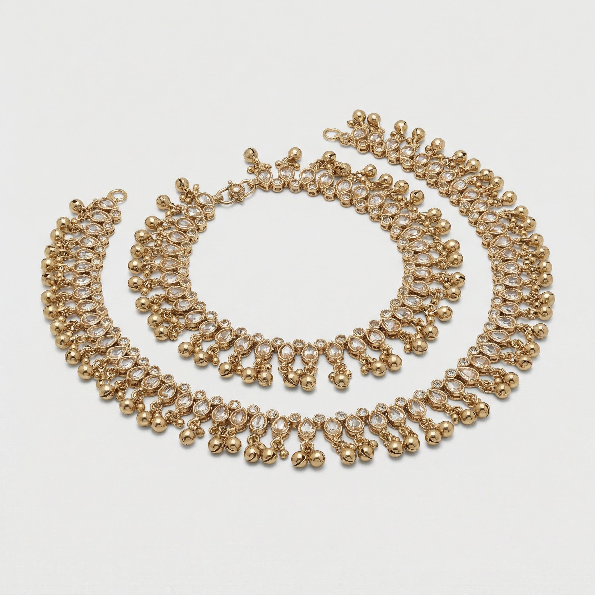 Sitara Kundan Payal detail showing oval kundan settings and scalloped bell border