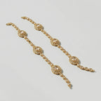 Gilded Kundan Anklets detail showing champagne center stones and clear pavé halos