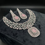 South Asian woman wearing the silver-tone rose quartz necklace with matching earrings — bridal look