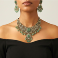 Soft Sage Drop Necklace Set necklace with matching earrings, studio flatlay