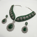 South Asian woman wearing Emerald Crest Statement Necklace Set statement necklace with matching earrings — bridal look