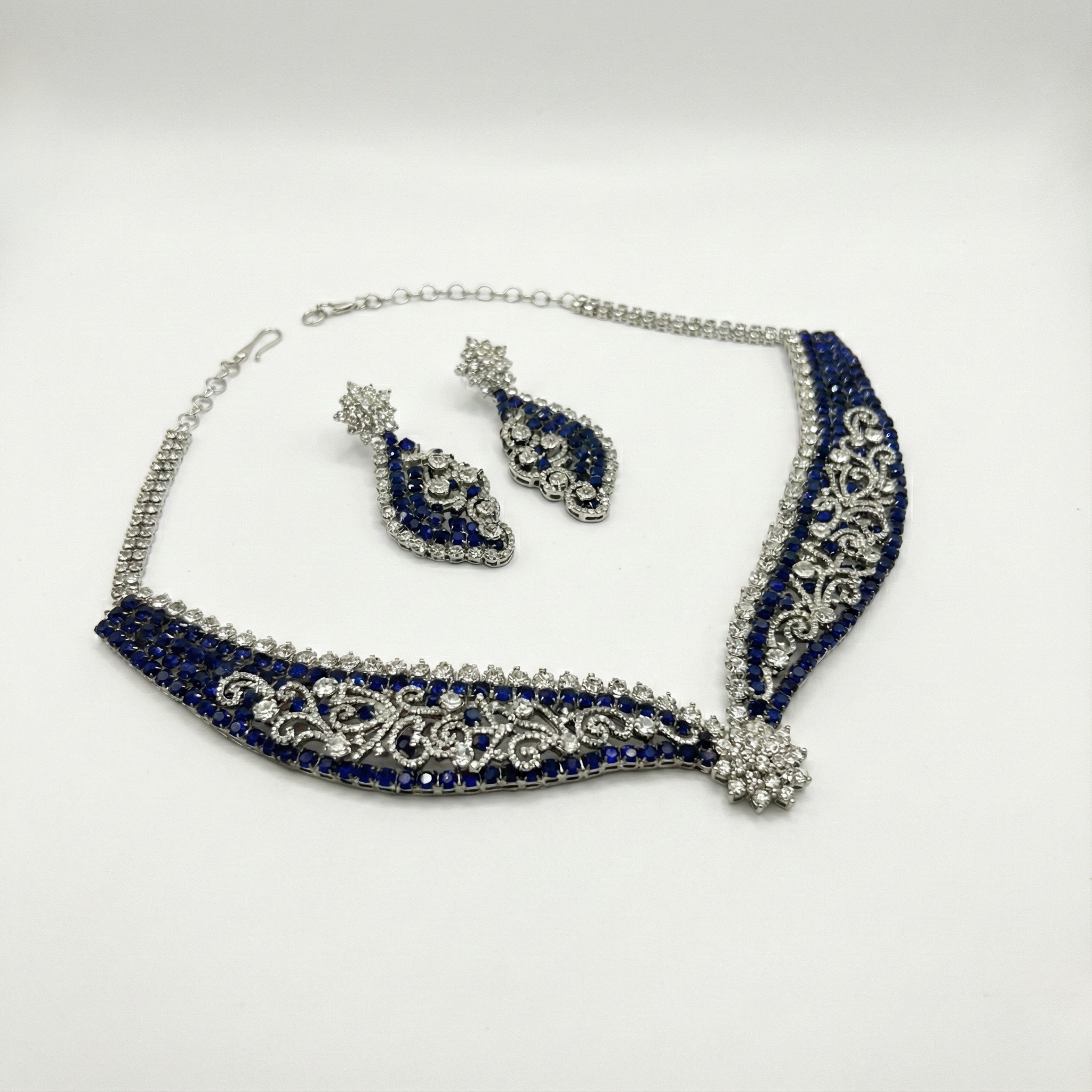 South Asian woman wearing Blue Noir Statement Necklace Set statement necklace with matching earrings — bridal look
