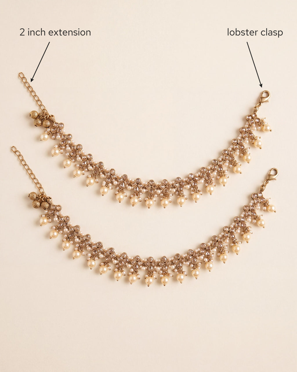 Pair of Classic Pearl anklets laid flat, showing the 2 inch extension and lobster clasp