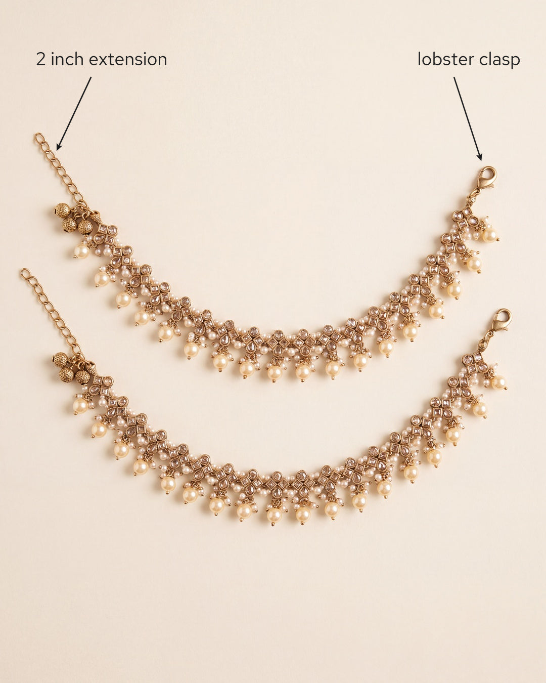 Pair of Classic Pearl anklets laid flat, showing the 2 inch extension and lobster clasp