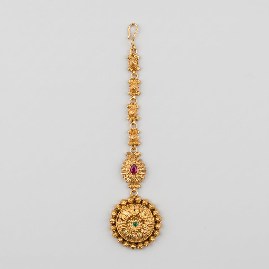 Kamal Floral Tikka antique gold maang tikka with lotus chain and floral round pendant on gray background