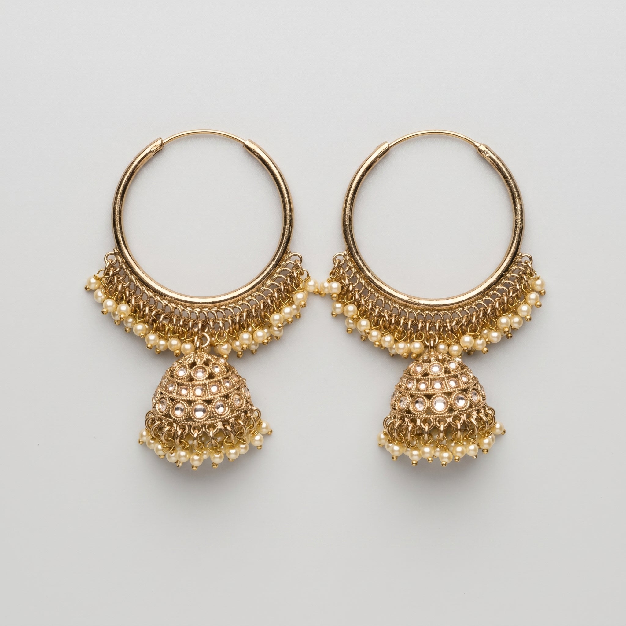 Kundan Moti Earrings gold-tone pearl fringe hoops with kundan jhumka drops on gray background