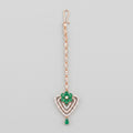 Pushpa Emerald Tikka rose gold-tone maang tikka with green floral heart pendant on gray background